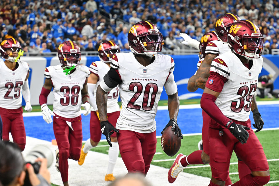 Washington's defense celebrates one of its five takeaways against the Lions. (Steven King/Icon Sportswire via Getty Images)