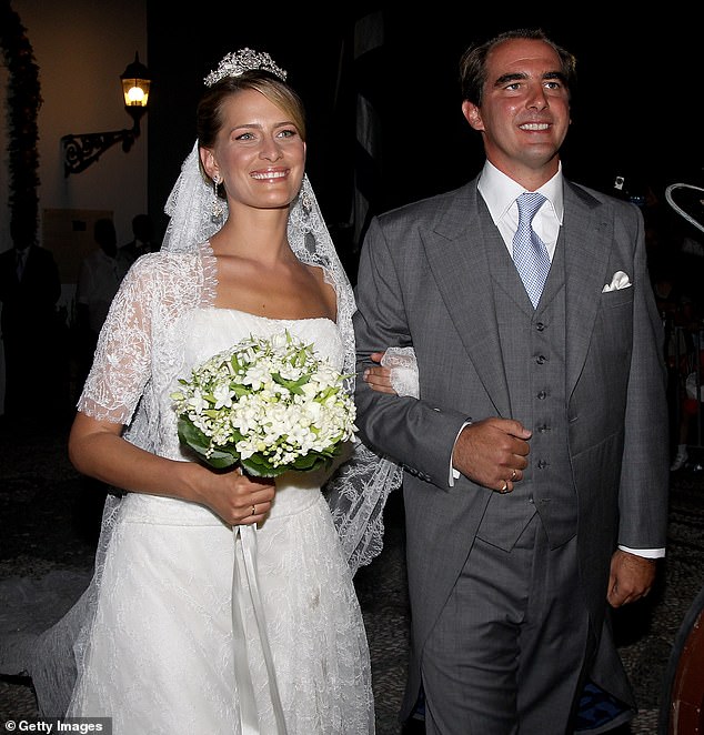 Princess Tatiana (left) said spoken out for the first time following her divorce from Prince Nikolaos, (right) revealing she has had a 'difficult year'. Pictured at their wedding in 2010
