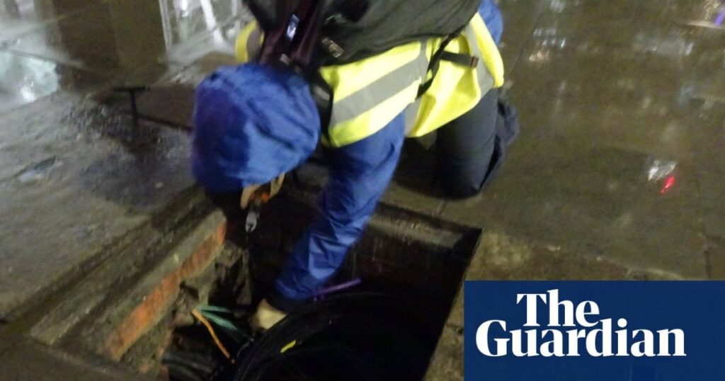 Man arrested after climate  activists cut UK insurance  firms' fibre optic cables