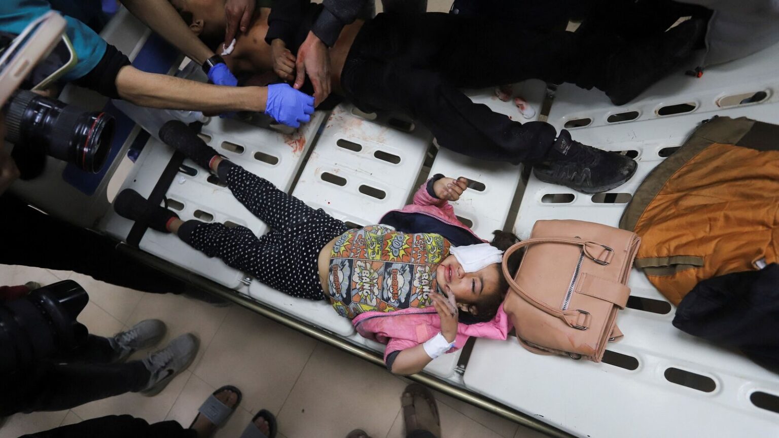 Gaza babies die from hypothermia at 7°C amid war with Israel Palestinian children wounded in an Israeli strike are assisted at a hospital in Deir Al-Balah in the central Gaza Strip