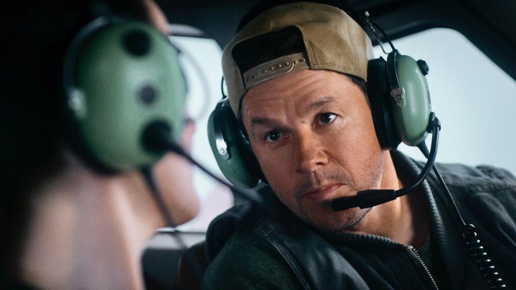 Mel Gibson’s ‘Flight Risk’ is No. 1 at box office This image released by Lionsgate shows Michelle Dockery, left, and Mark Wahlberg in a scene from "Flight Risk." (Lionsgate via AP)
