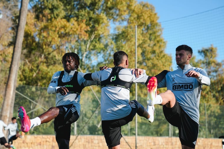 Olivier Mbaizo, Jesús Bueno, and Ian Glavinovich (from left) stretching at practice on Wednesday. Glavinovich has been the Union's only new signing so far this offseason.