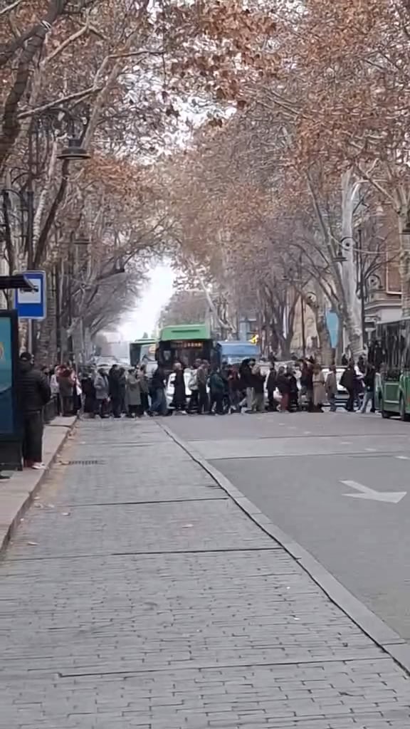 How do you legally block a road if your group isn’t big enough? Just keep walking back and forth on the crosswalk