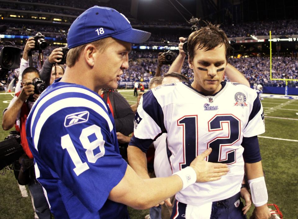 INDIANAPOLIS - NOVEMBER 15:  Quarterback Peyton Manning #18 of the Indianapolis Colts greets Tom Brady #12 of the New England Patriots after the game at Lucas Oil Stadium on November 15, 2009 in Indianapolis, Indiana.  The Colts won the game 35-34. (Photo by Jamie Squire/Getty Images)