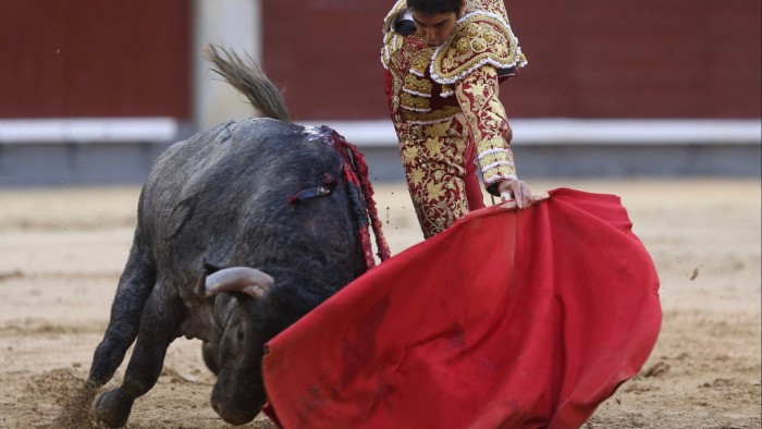 Spain’s housing crisis is the bull that needs to be poked Spanish matador Miguel Angel Perera performs a pass with muleta on a bull during the Hispanic Day bullfight at Las Ventas bullring, in Madrid
