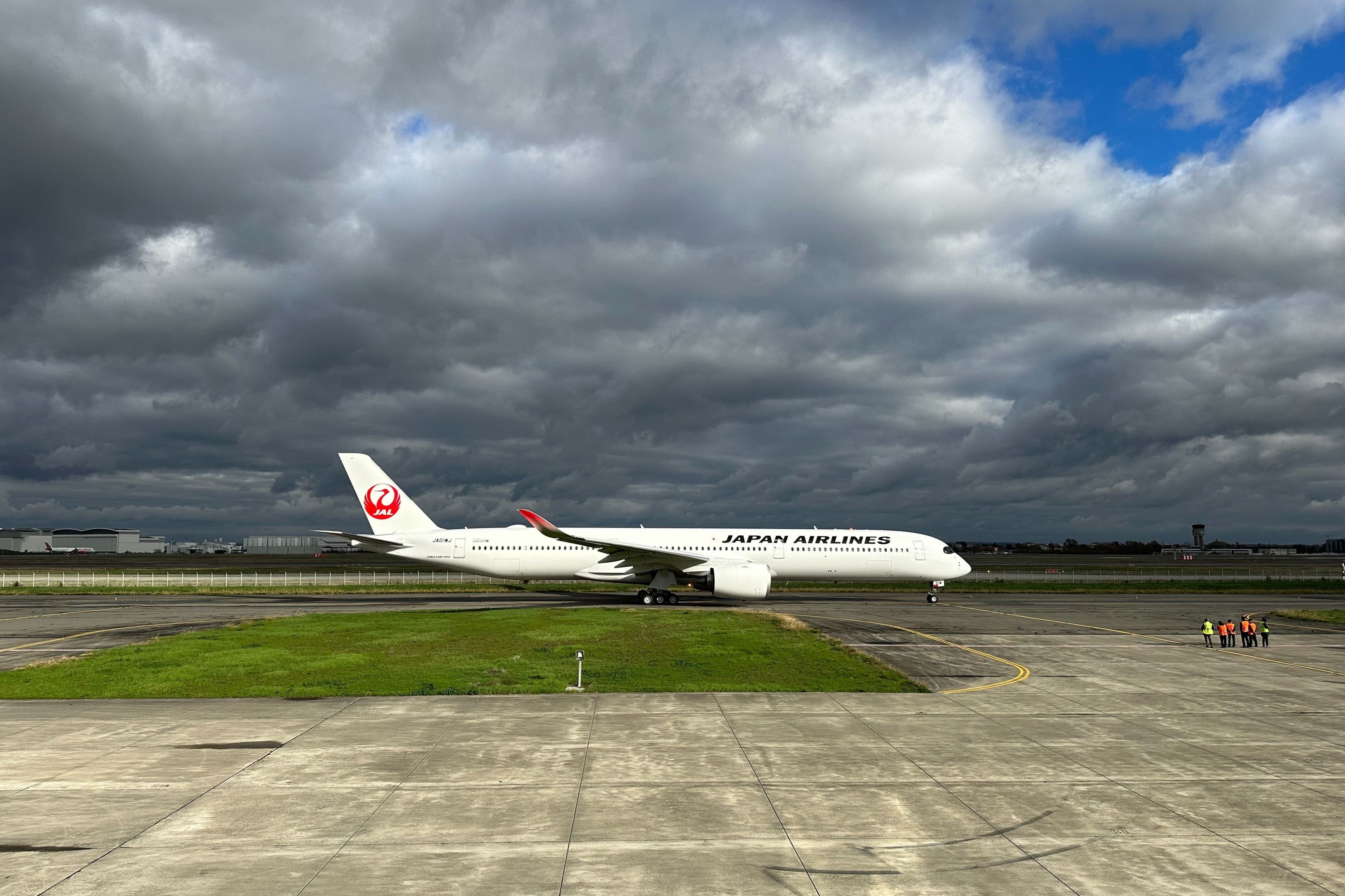 A Japan Airlines Airbus A350-1000 on the airport apron in Toulouse.