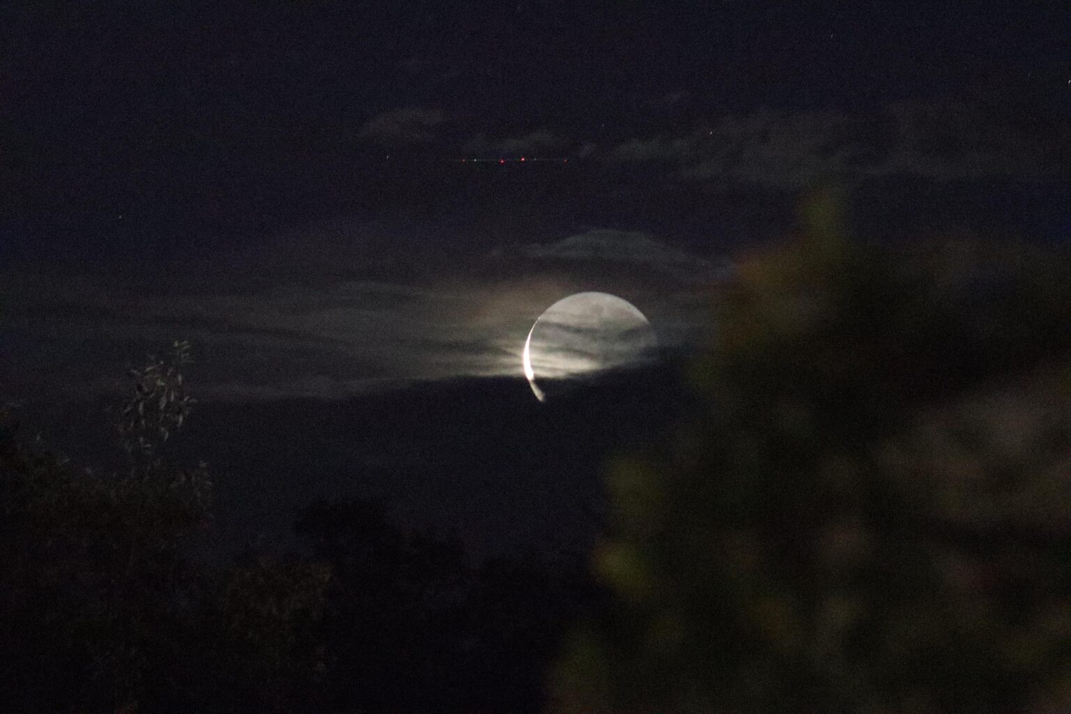 My favorite moon photo i took! I like the mood of this one. Can someone explain the red/green lights?
