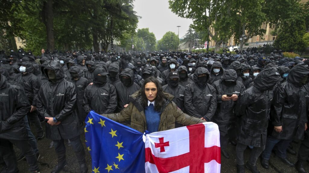 Protesters throng streets of Georgia's capital after parliament passes so-called 'Russian law'