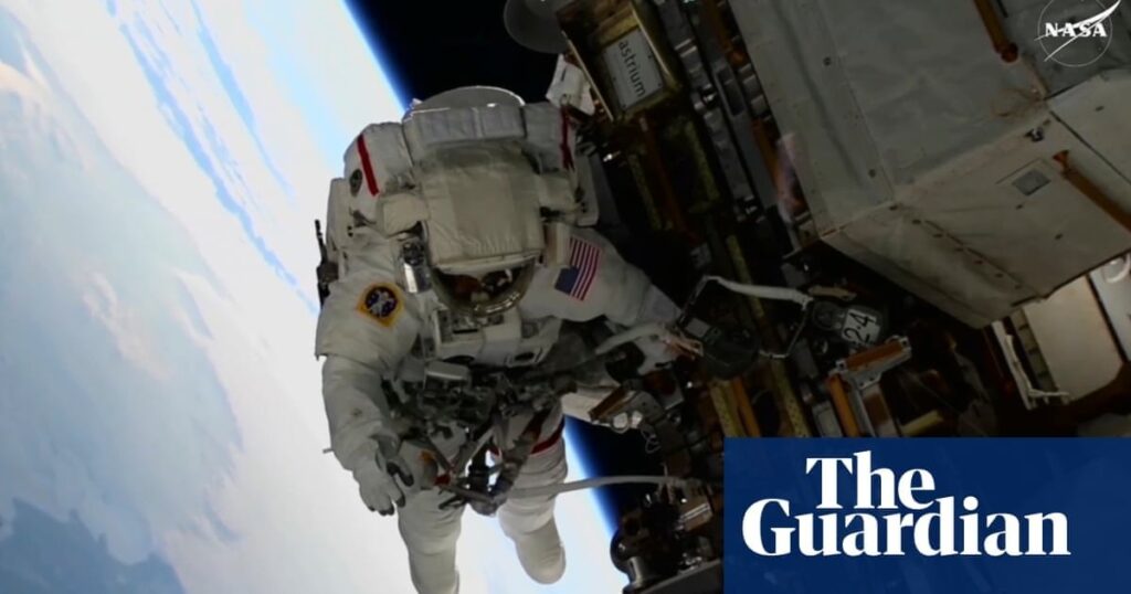 Nasa’s two ‘stuck’ astronauts exit space station for first spacewalk together
