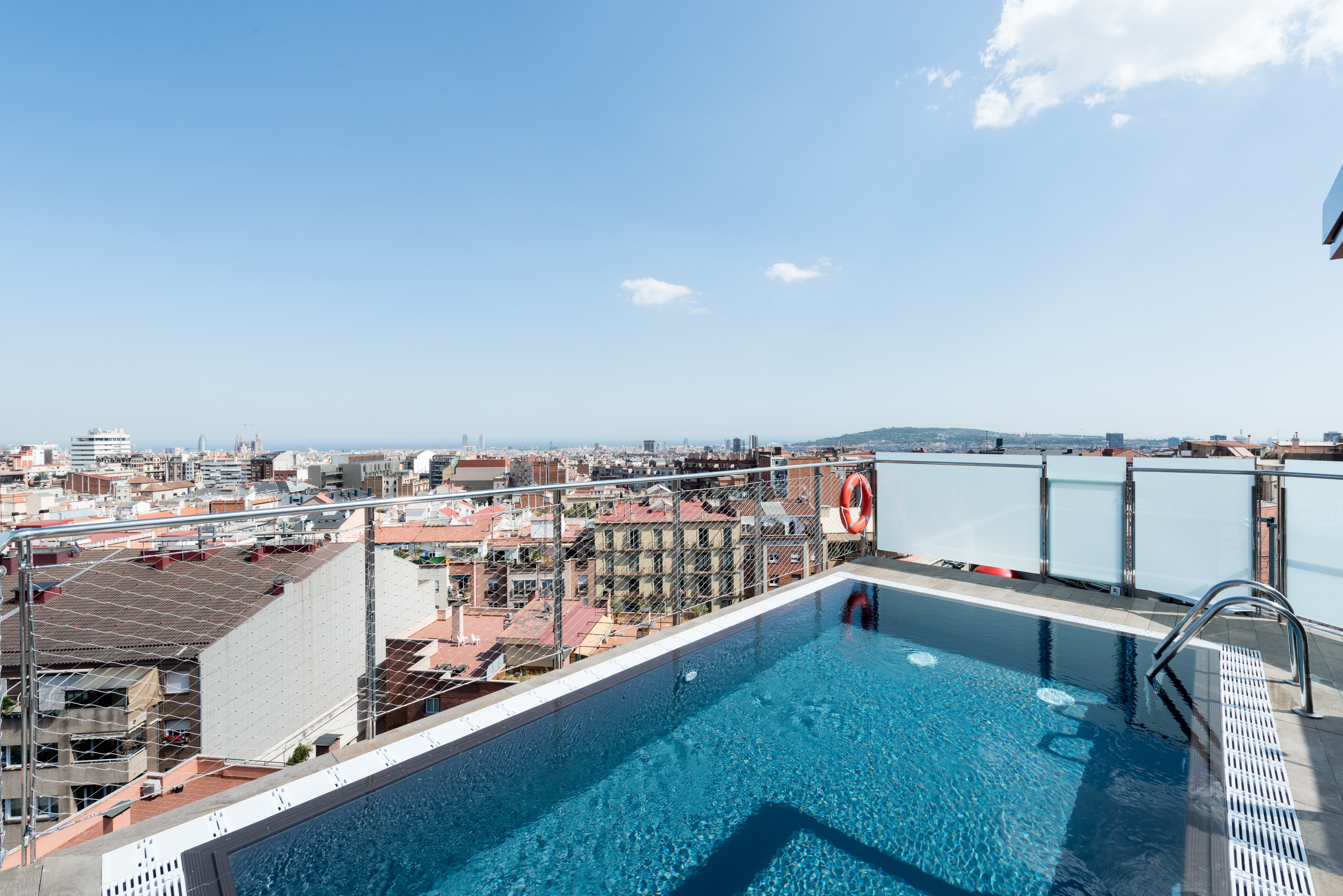 Rooftop pool overlooking Barcelona.