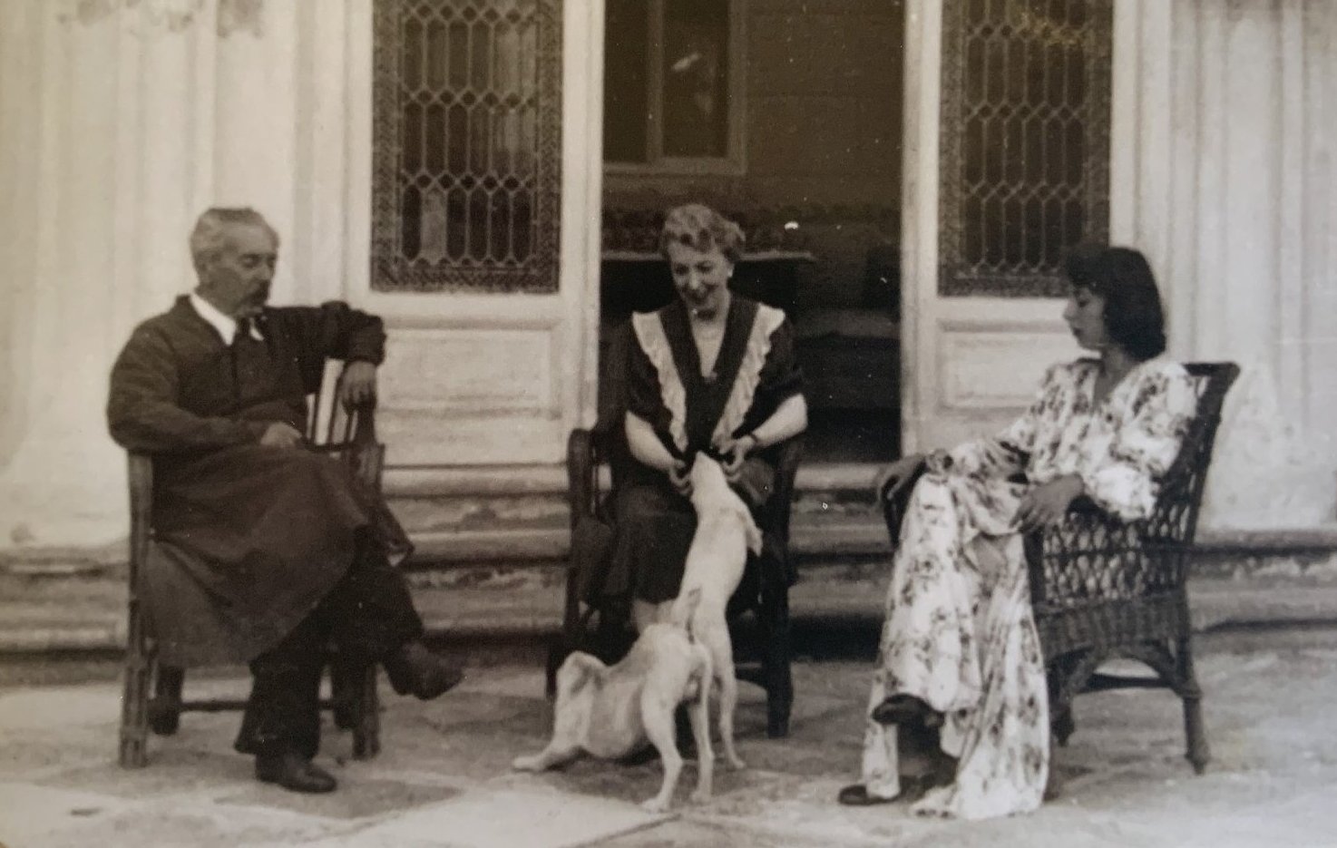Miklós Bánffy with his family and dog outside Bonțida castle.
