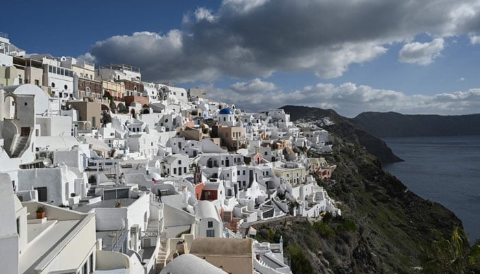 This photograph shows a general view of the Oia village on the Greek island of Santorini while the authorities restrict the access to the tourists in some areas as a precaution due to recent seismic activity on February 5, 2025.—AFP