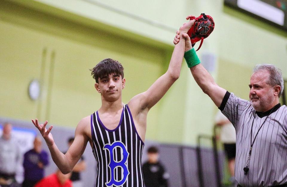 Birmingham's Henry Aslikyan wins the City Section individual wrestling title.