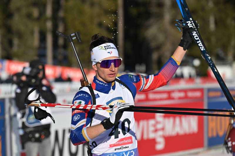 France's Eric Perrot reacts after the Men 20 km Individual event of the IBU Biathlon World Championship of Lenzerheide. Martin Schutt/dpa