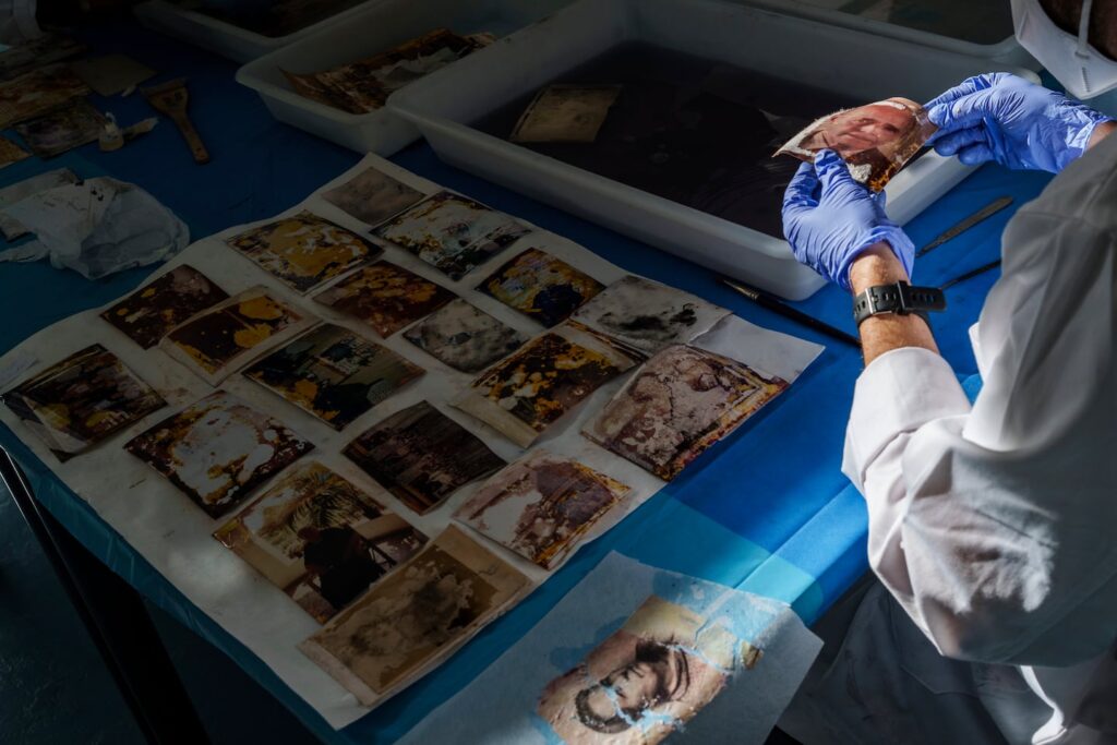 For flood survivors in Spain, a photo project helps recover memories A volunteer stabilized family photos as part of a restoration process conducted by students and professors from the Conservation and Restoration program at a field laboratory at the Universitat Politecnica de Valencia.