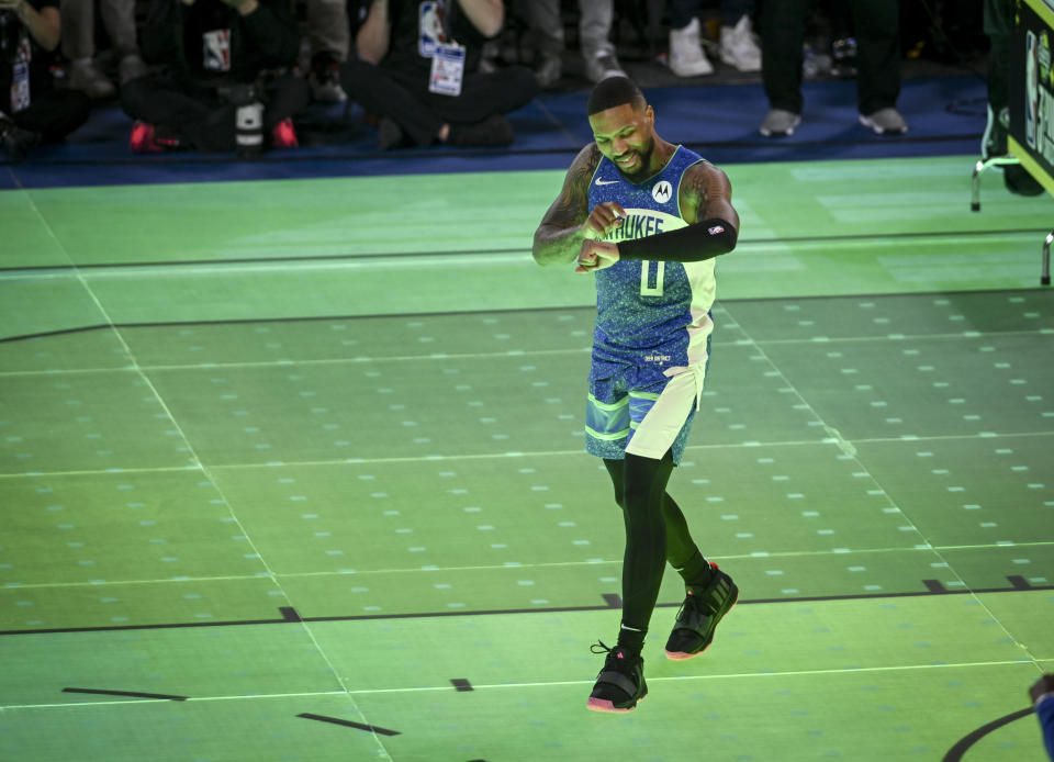 INDIANAPOLIS , IN - FEBRUARY 17: Damian Lillard calls Dame Time after winning during the NBA All-Star Three-Point contest at Lucas Oil Stadium in Indianapolis, Indiana on Saturday, February 17, 2024. (Photo by AAron Ontiveroz/The Denver Post)
