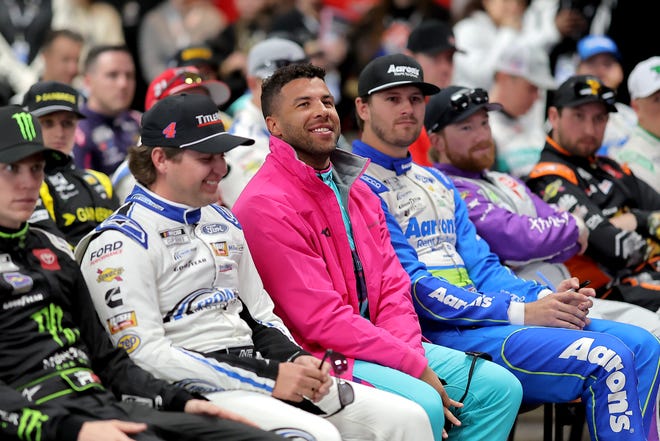 HAMPTON, GEORGIA - FEBRUARY 23: Bubba Wallace, driver of the #23 Columbia Sportswear Toyota, (C) attends the Drivers Meeting prior to the NASCAR Cup Series Ambetter Health 400 at Atlanta Motor Speedway on February 23, 2025 in Hampton, Georgia. (Photo by Jonathan Bachman/Getty Images)