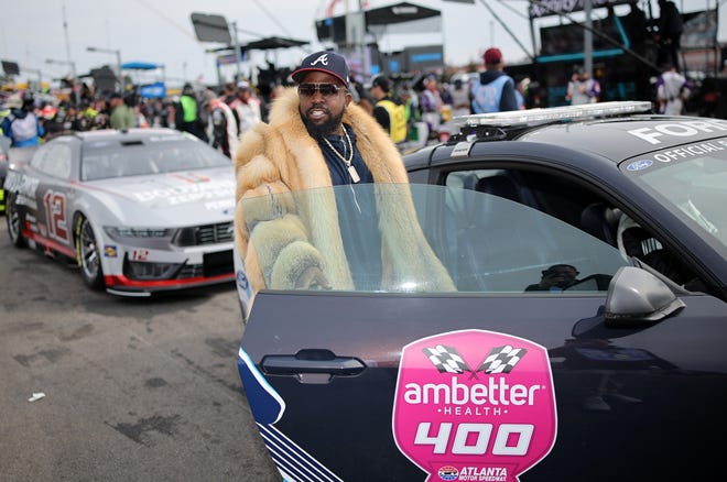 HAMPTON, GEORGIA - FEBRUARY 23: Honorary Pace Car Rider, Big Boi enters the pace car during pre-race ceremonies prior to the NASCAR Cup Series Ambetter Health 400 at Atlanta Motor Speedway on February 23, 2025 in Hampton, Georgia. (Photo by Jonathan Bachman/Getty Images)