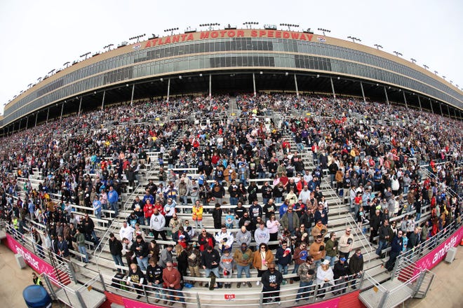 HAMPTON, GEORGIA - FEBRUARY 23: A general view of the grandstands during the national anthem prior to the NASCAR Cup Series Ambetter Health 400 at Atlanta Motor Speedway on February 23, 2025 in Hampton, Georgia. (Photo by Chris Graythen/Getty Images)