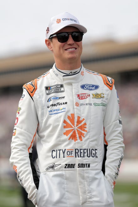 HAMPTON, GEORGIA - FEBRUARY 23: Zane Smith, driver of the #38 City of Refuge Ford, looks on from the grid prior to the NASCAR Cup Series Ambetter Health 400 at Atlanta Motor Speedway on February 23, 2025 in Hampton, Georgia. (Photo by Jonathan Bachman/Getty Images)