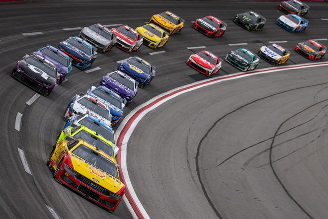 HAMPTON, GEORGIA - FEBRUARY 23: Joey Logano, driver of the #22 Shell Pennzoil Ford, leads the field during the NASCAR Cup Series Ambetter Health 400 at Atlanta Motor Speedway on February 23, 2025 in Hampton, Georgia. (Photo by Chris Graythen/Getty Images)