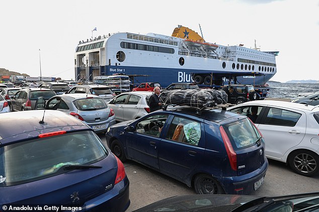 Residents and tourists scramble to leave Greek island on ferries
