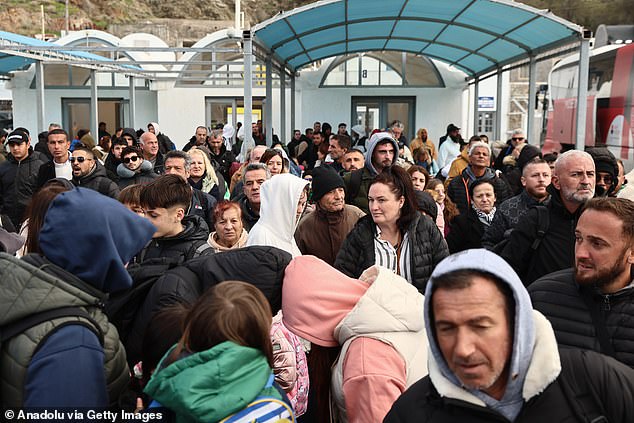 Residents and tourists scramble to leave Greek island on ferries and planes due to ongoing seismic activity in Santorini