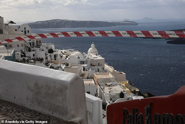 A police cordon blocks access to an area in Santorini as earthquake fears prompt heightened safety measures