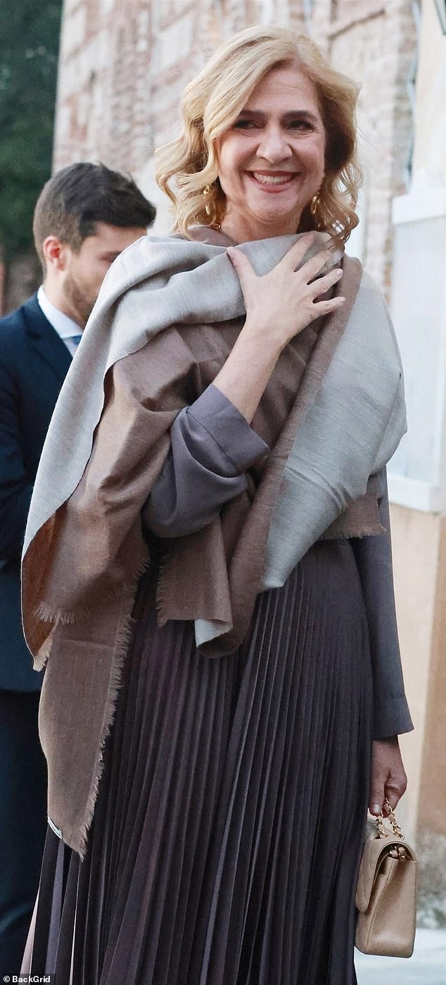 Infanta Cristina of Spain (pictured), sixth in line to the Spanish throne, looked elegant in a muted, neutral ensemble