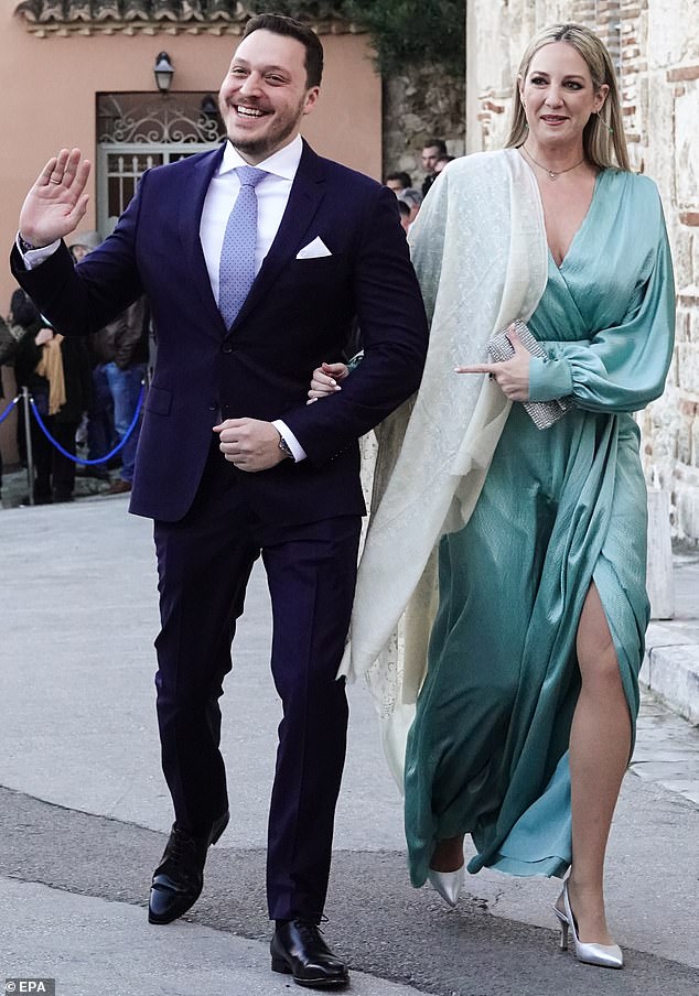 Princess Theodora of Greece (pictured, right) was the very image of glamour as she attended the event with her husband Matthew Kumar (pictured, left)