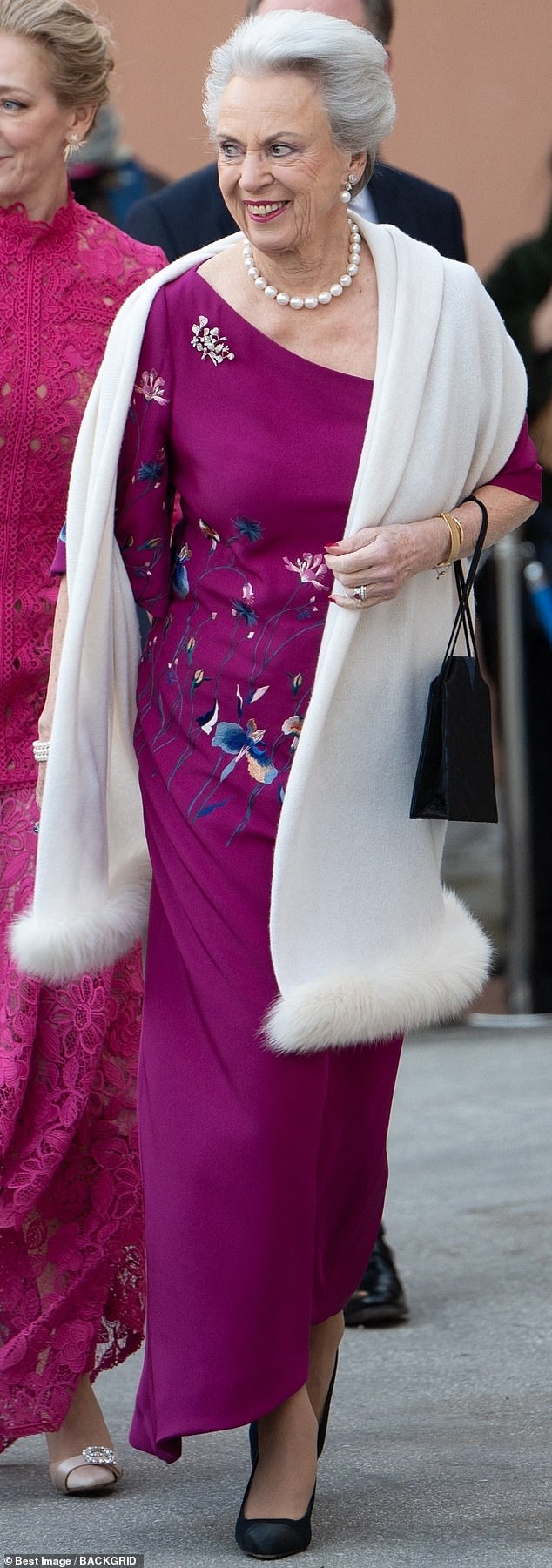 Princess Benedikte of Denmark (pictured) pulled out all the stops for the wedding, and looked stunning in a bold-hued fuchsia gown