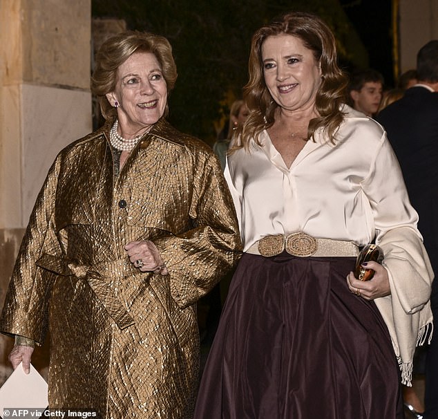 Queen Anne-Marie (pictured, left) looked elegant as she was photographed at the event with Princess Alexia of Greece and Denmark (pictured, right)