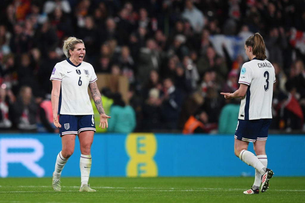 Millie Bright and Niamh Charles celebrate England's victory