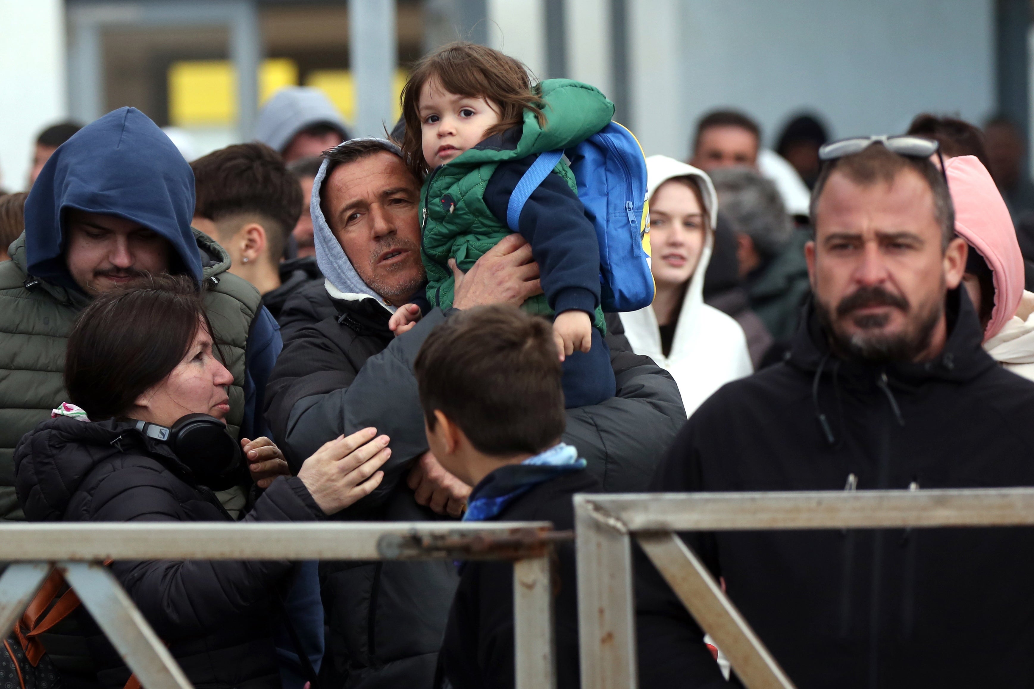 Residents and visitors wait to leave Santorini due to the increased seismic activity