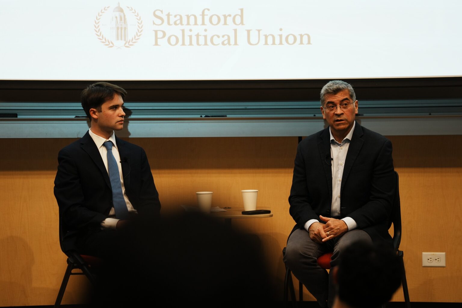 Xavier Becerra seated at Bishop Auditorium