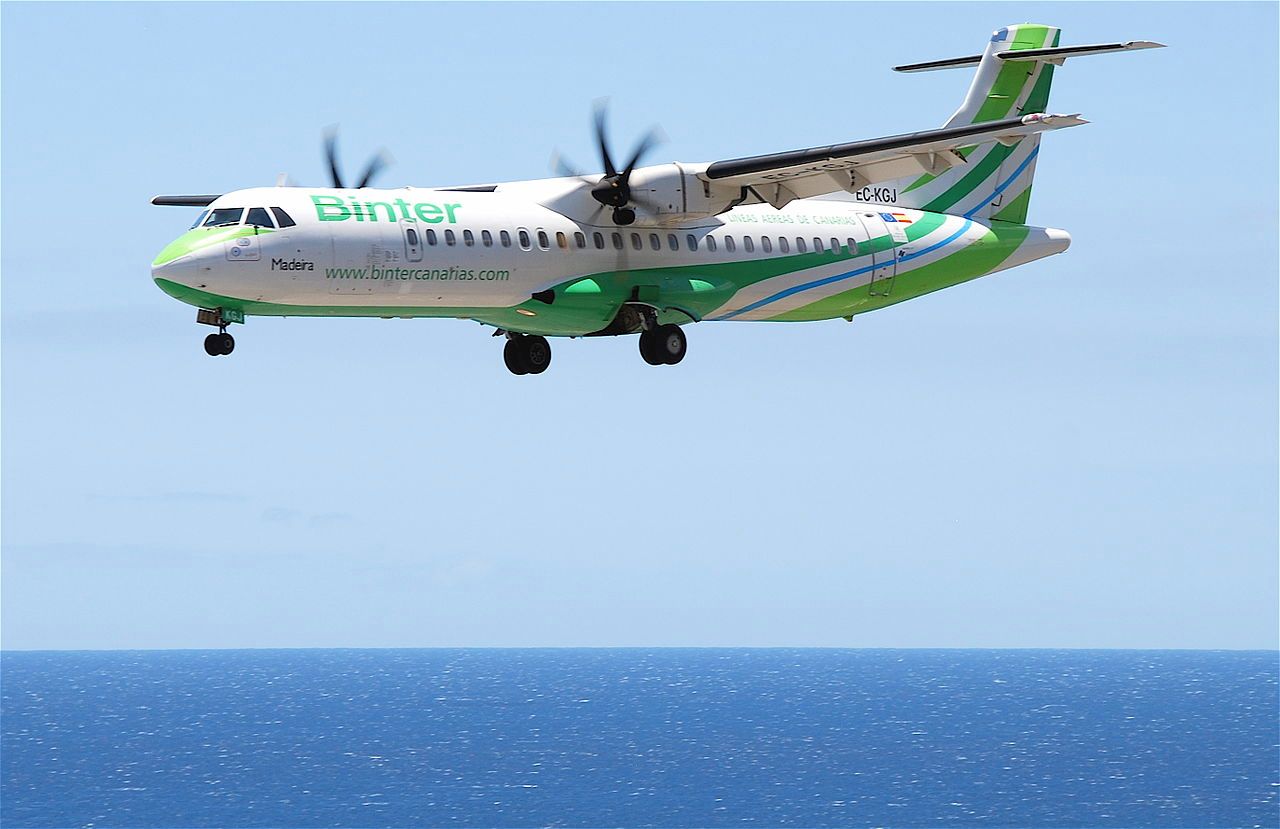 A Binter Canarias ATR72-500 landing at an airport in the Canary Islands.