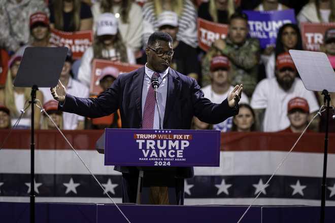 MACON, GEORGIA - NOVEMBER 03: Former NFL running back and former Republican candidate for U.S. Senate Herschel Walker addresses the crowd at a rally for Republican presidential candidate and former President Donald Trump at the Atrium Health Ampitheater on November 03, 2024 in Macon, Georgia. With only two days until the election, Trump is campaigning for re-election on Sunday in the battleground states of Pennsylvania, North Carolina and Georgia.  (Photo by John Moore/Getty Images)