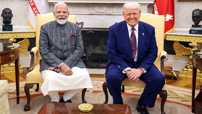 Narendra Modi and Donald Trump sit together in the White House
