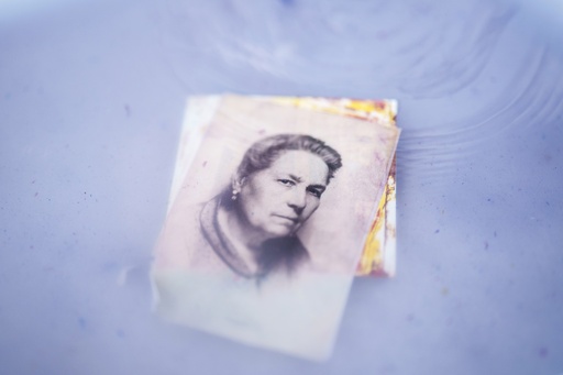 For flood survivors in Spain, a photo project helps recover memories A picture damaged during the devastating flash floods last year in Valencia, Spain, is submerged in water as part of a restoration process conducted by students from the Conservation and Restoration program at a field laboratory at the Universitat Politecnica de Valencia, Thursday, Jan. 16, 2025. (AP Photo/Bernat Armangue)