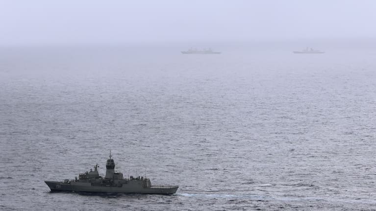 The HMAS Arunta, left, shadows the People's Liberation Army-Navy Jiangkai-class frigate Hengyang and a Fuchi-class replenishment vessel in the Tasman Sea on February 13.