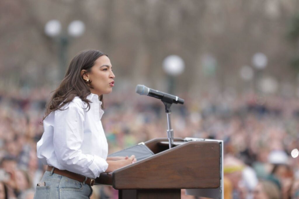 A close-up as Alexandria Ocasio-Cortez speaks in Civic Center Park.