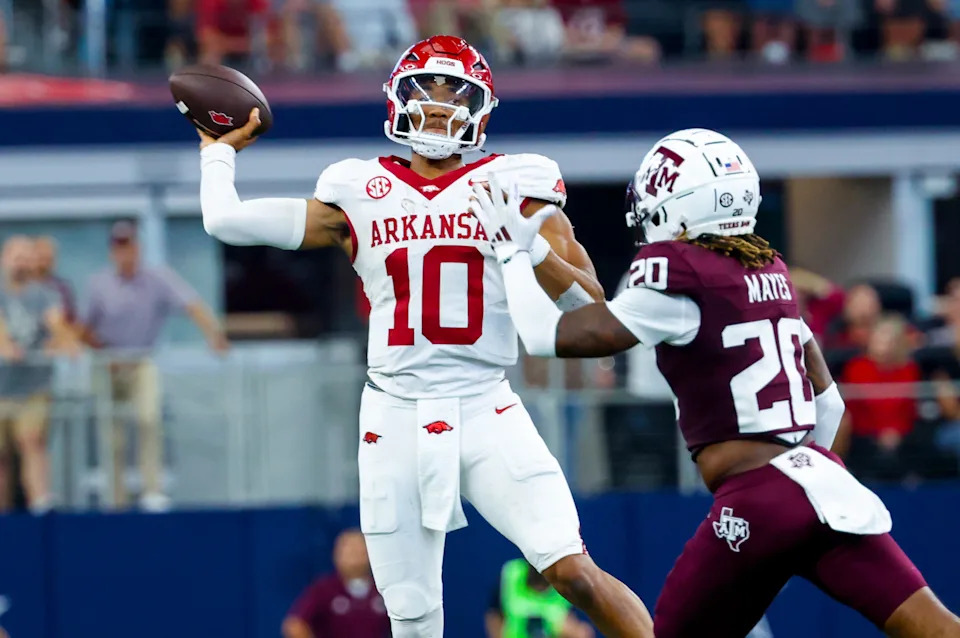 Sep 28, 2024; Arlington, Texas, USA; Arkansas Razorbacks quarterback Taylen Green (10) throws past Texas A&M Aggies defensive back BJ Mayes (20) during the second half at AT&T Stadium. Mandatory Credit: Kevin Jairaj-Imagn Images