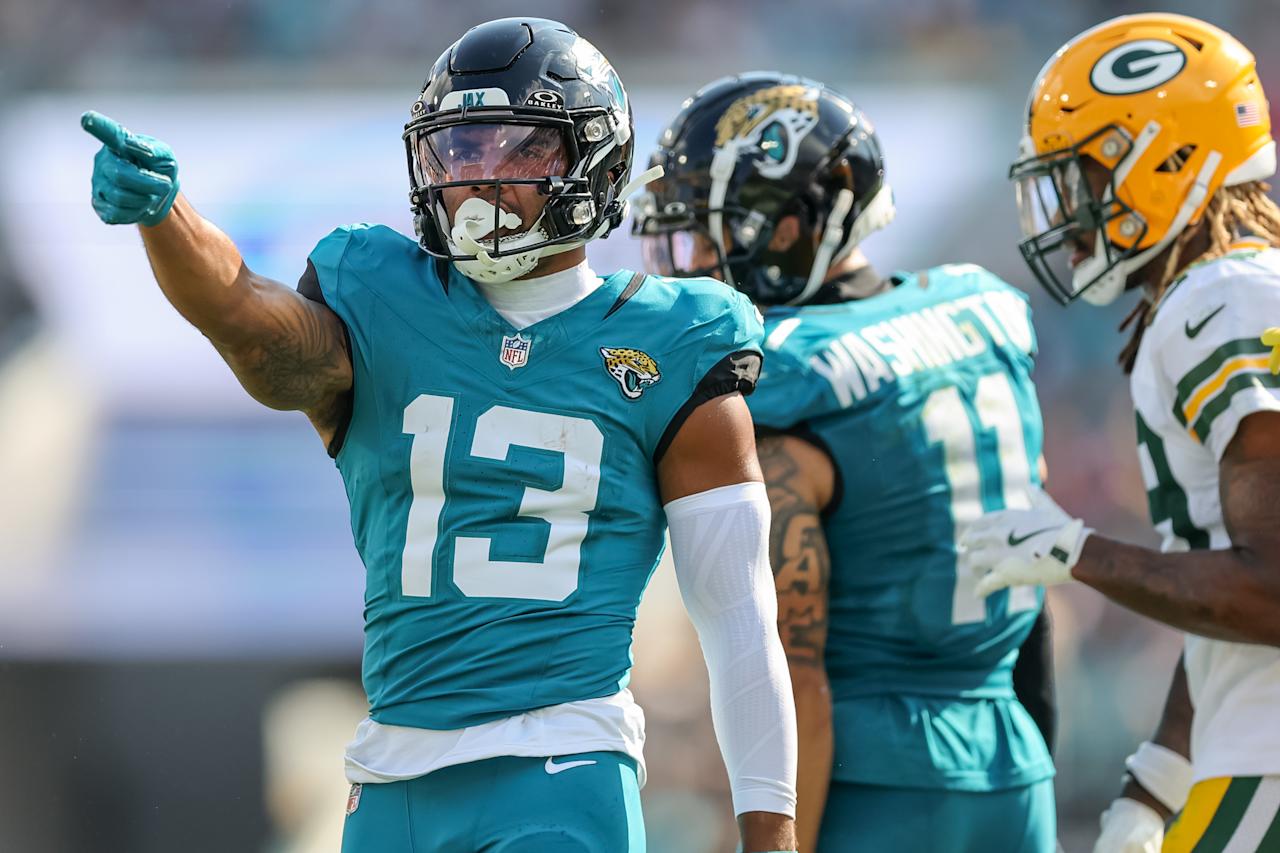 JACKSONVILLE, FLORIDA - OCTOBER 27: Christian Kirk #13 of the Jacksonville Jaguars celebrates a first down catch against the Green Bay Packers during the game at EverBank Field on October 27, 2024 in Jacksonville, Florida. (Photo by Mike Carlson/Getty Images)