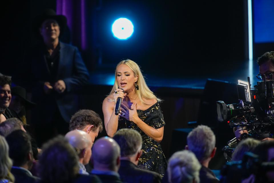 Carrie Underwood sings to Randy Travis at NBC's Opry 100: A Live Celebration event at the Grand Ole Opry in Nashville, Tenn., Wednesday, March 19, 2025.