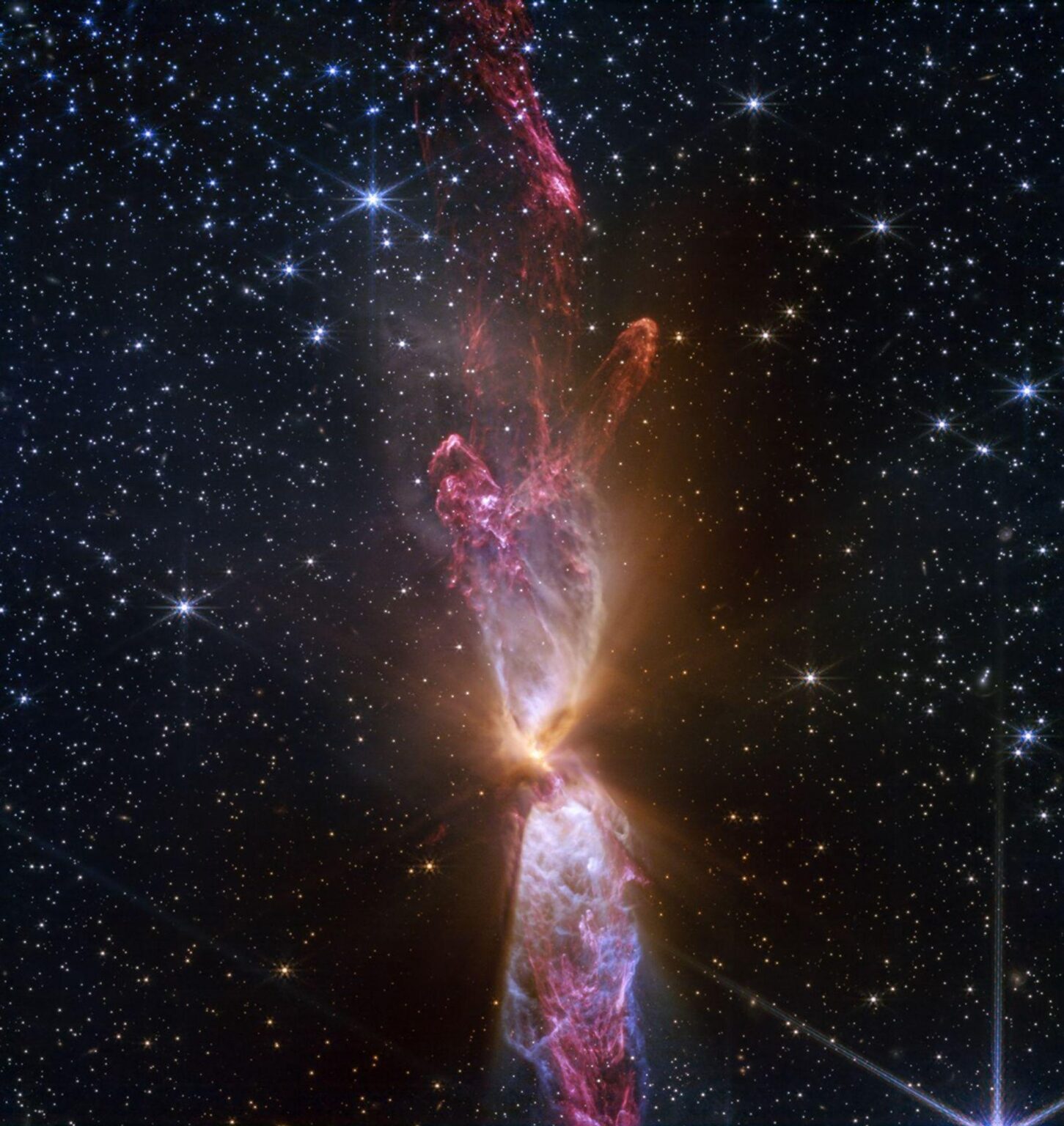 Webb Telescope Captures a Stunning Hourglass of Stars in the Making