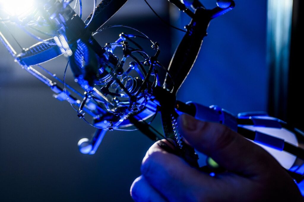 Northeastern engineers develop hybrid robot that balances strength and flexibility — and can screw in a lightbulb