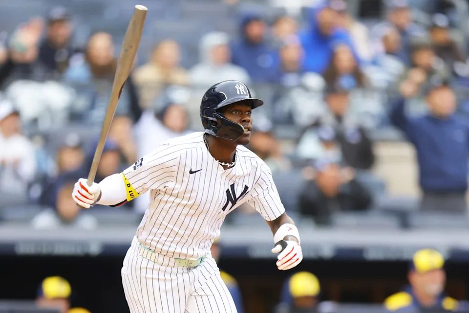 NEW YORK, NEW YORK - MARCH 30: Jazz Chisholm Jr. #13 of the New York Yankees hits a 2-run home run in the third inning against the Milwaukee Brewers at Yankee Stadium on March 30, 2025 in New York City. (Photo by Mike Stobe/Getty Images)