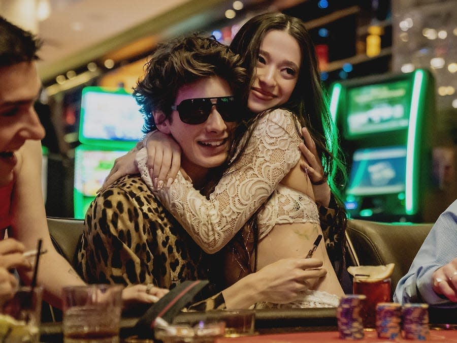 Mark Eydelshteyn and Mikey Madison gambling in Las Vegas in "Anora."