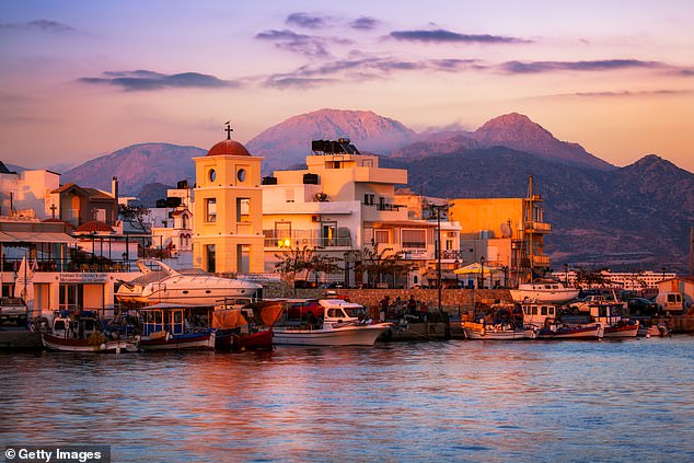 The sunset over the island of Crete in Greece