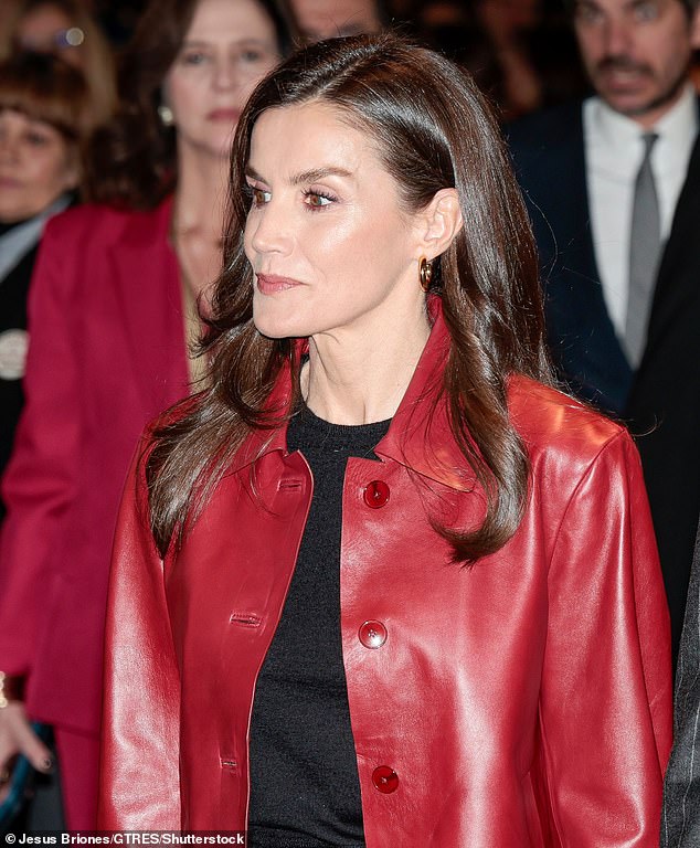 Walking alongside her husband, art-lover Letizia (pictured) admired the works on display at the annual event